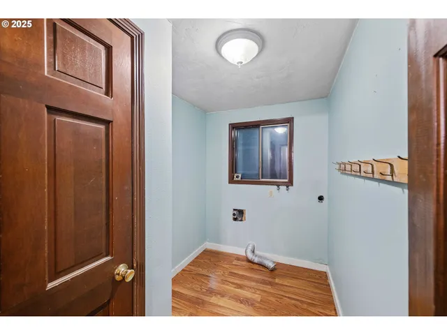 a view of a porch with wooden floor