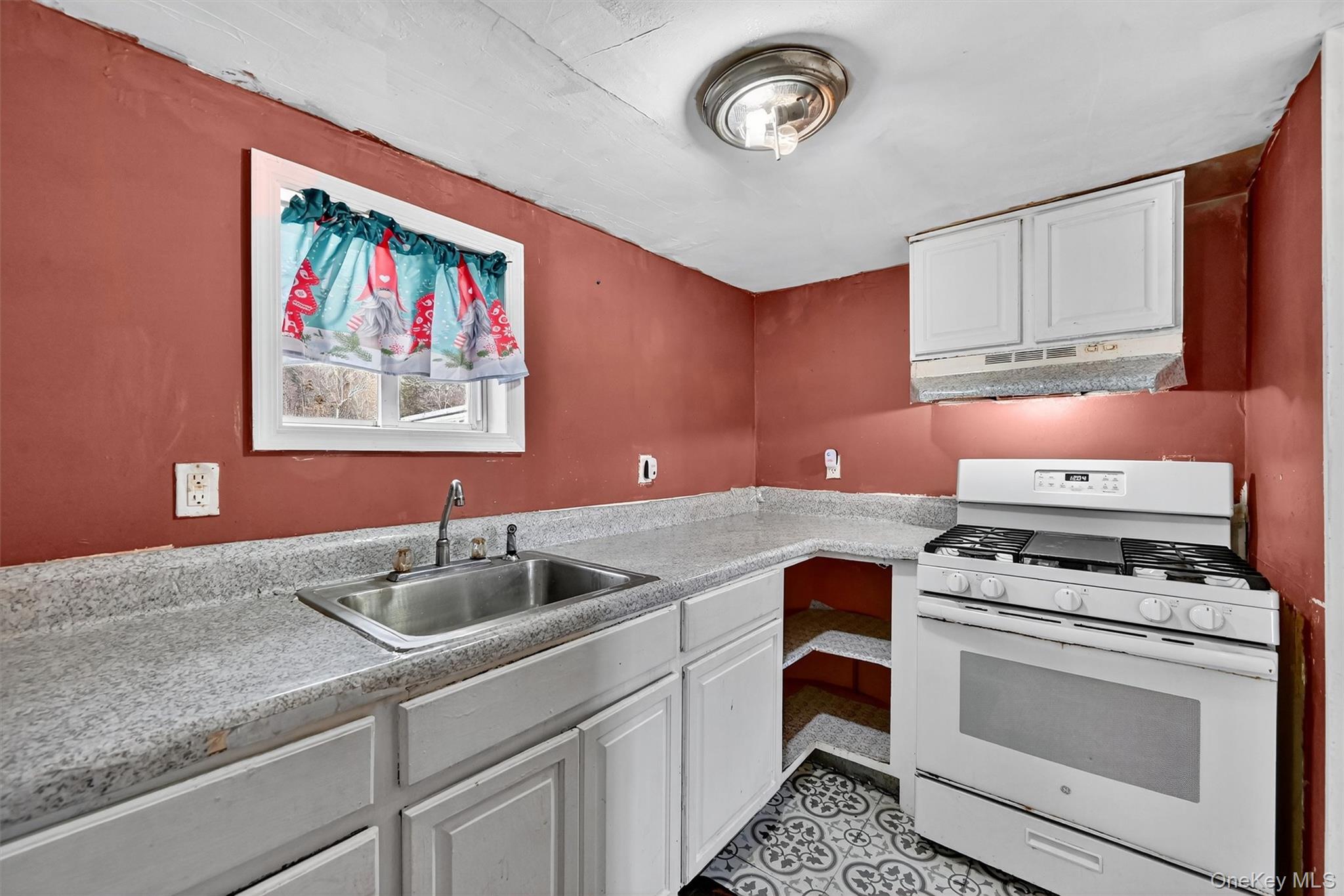 1187 Burlingham Road Pine Bush, NY 12566 - Photo 14 of 26 a kitchen with a sink cabinets and appliances