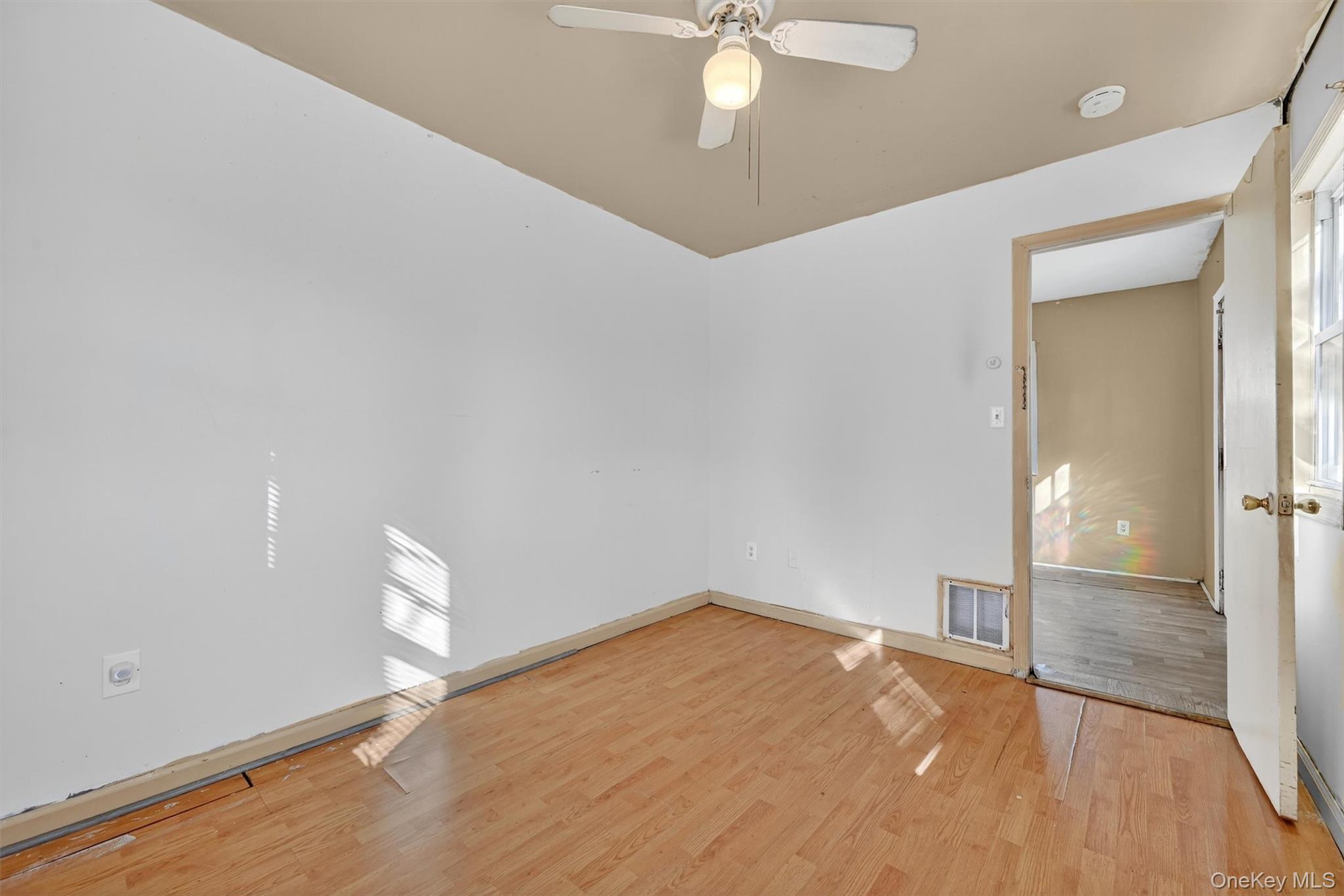1187 Burlingham Road Pine Bush, NY 12566 - Photo 19 of 26 a view of empty room with wooden floor