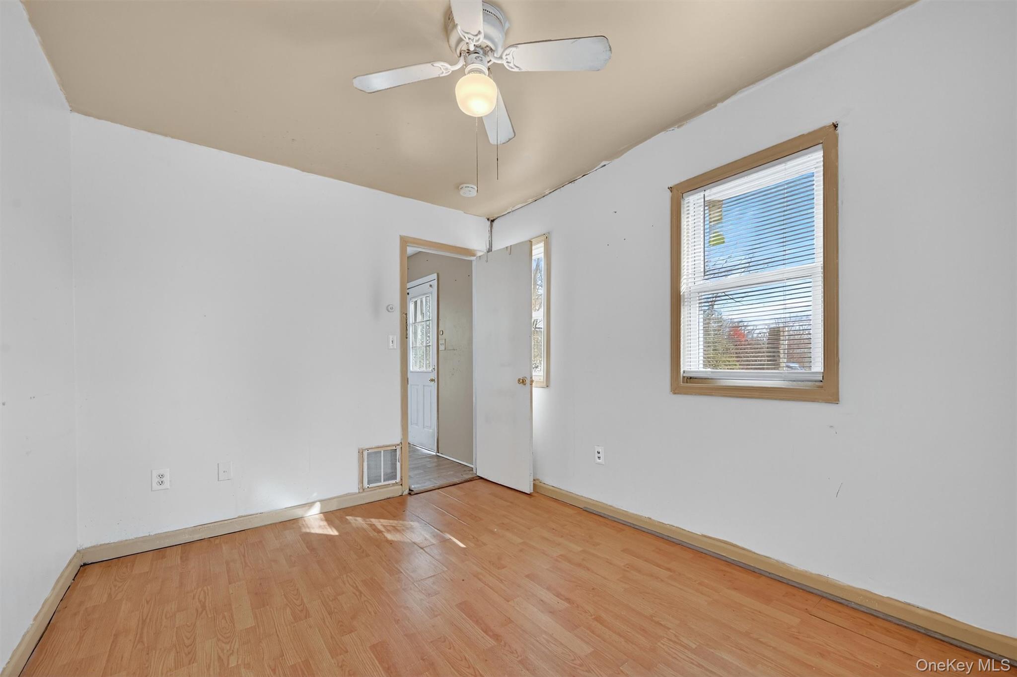 1187 Burlingham Road Pine Bush, NY 12566 - Photo 20 of 26 a view of an empty room with a window