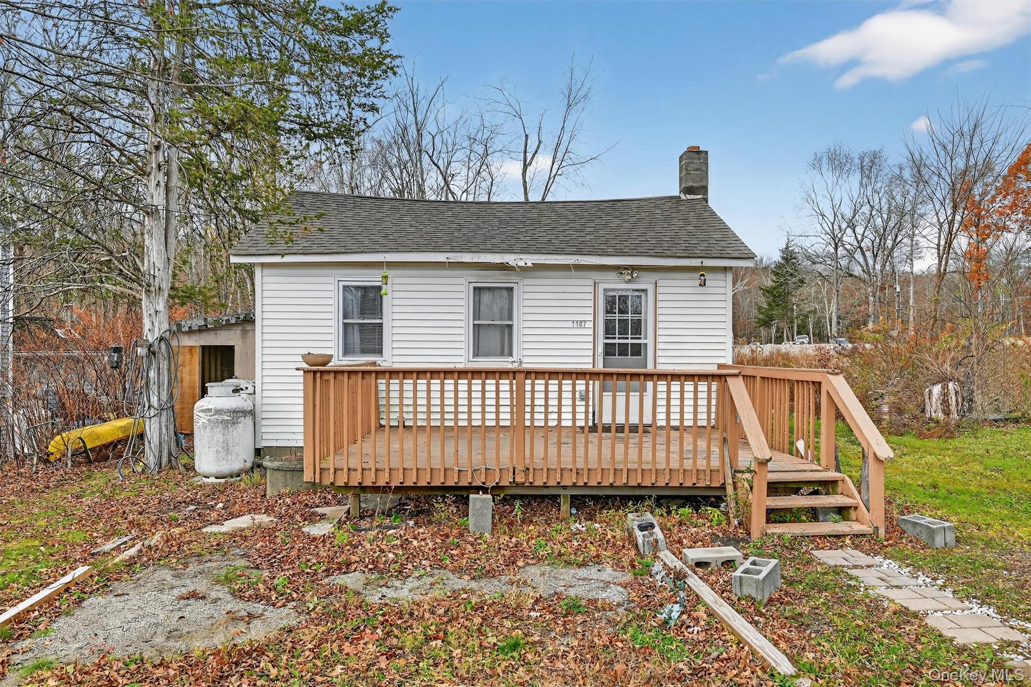 1187 Burlingham Road Pine Bush, NY 12566 - Photo 6 of 26 a view of a house with a wooden deck