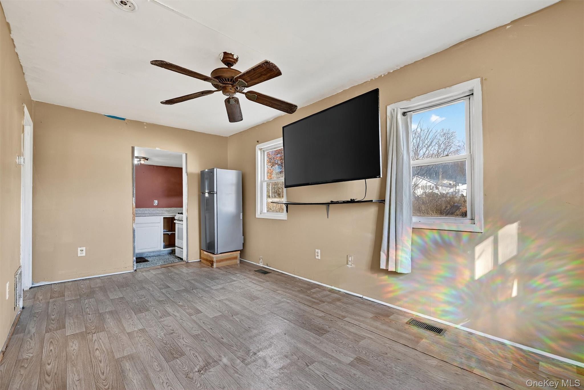 1187 Burlingham Road Pine Bush, NY 12566 - Photo 9 of 26 a view of a livingroom with a flat screen tv