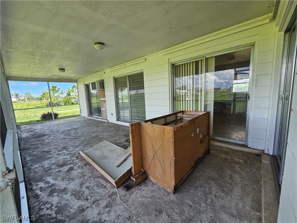 Undisclosed Address Lehigh Acres, FL 33936 - Photo 15 of 15 a living room with a large window