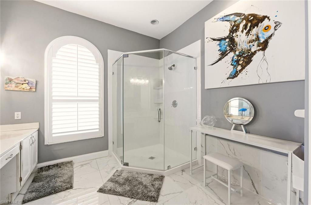 209 Countryside Drive Naples, FL 34104 - Photo 23 of 50 a view of an entryway with wooden floor