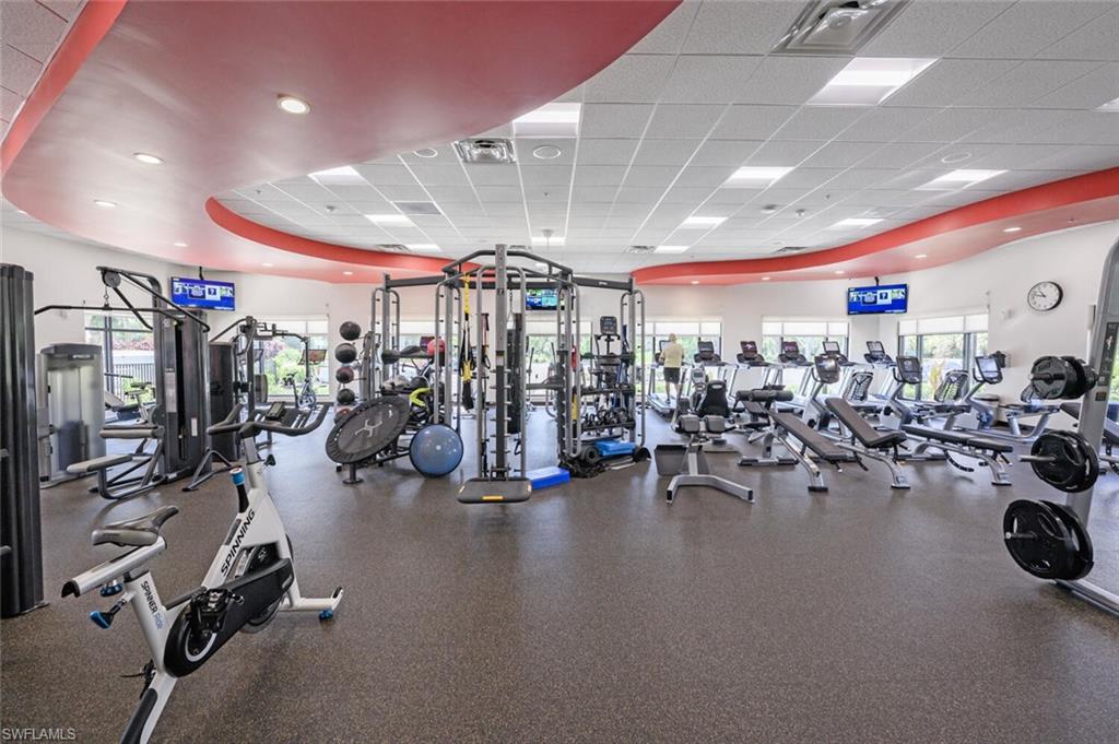 209 Countryside Drive Naples, FL 34104 - Photo 46 of 50 a view of a room with gym equipment