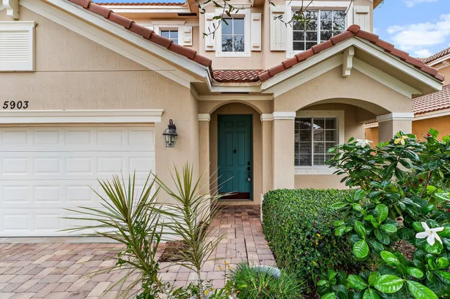 a view of a backyard with a garden