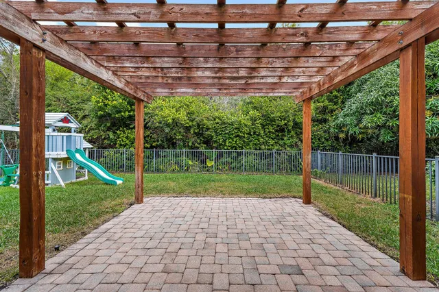 a kitchen with a stove a sink and a microwave