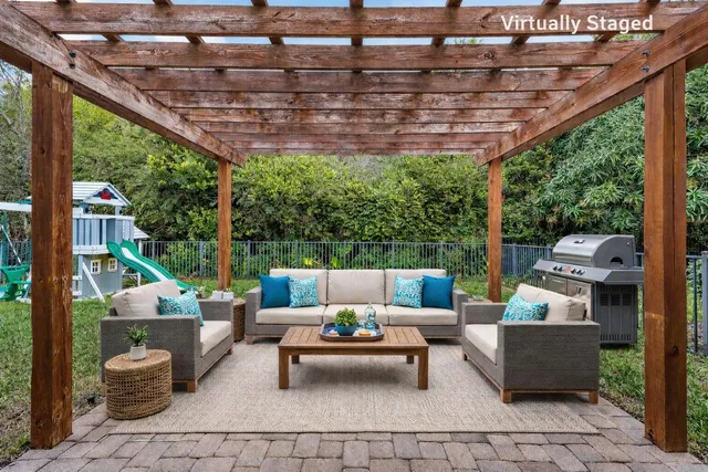a kitchen with granite countertop a sink and a window