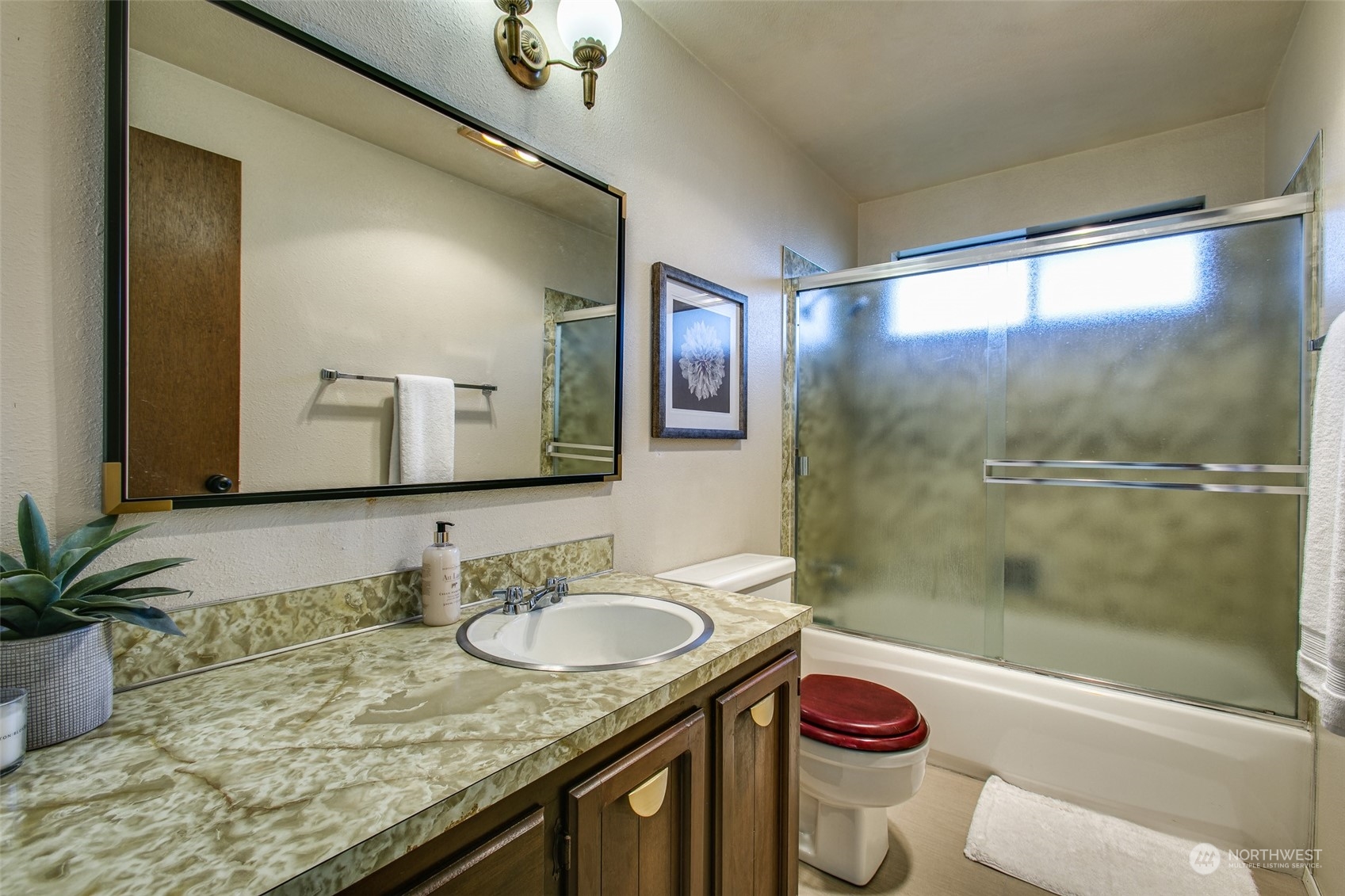 514 Cypress Road Bellingham, WA 98225 - Photo 15 of 31 a bathroom with a granite countertop sink toilet and shower