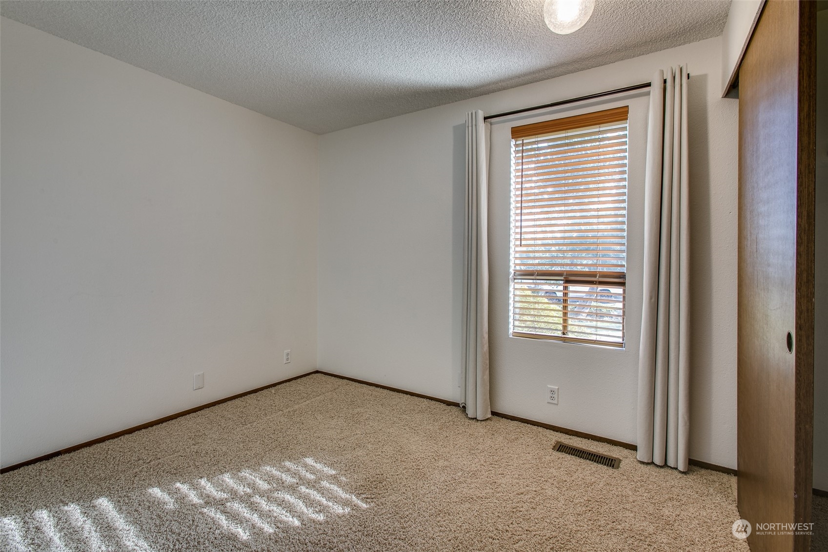 514 Cypress Road Bellingham, WA 98225 - Photo 16 of 31 an empty room with windows