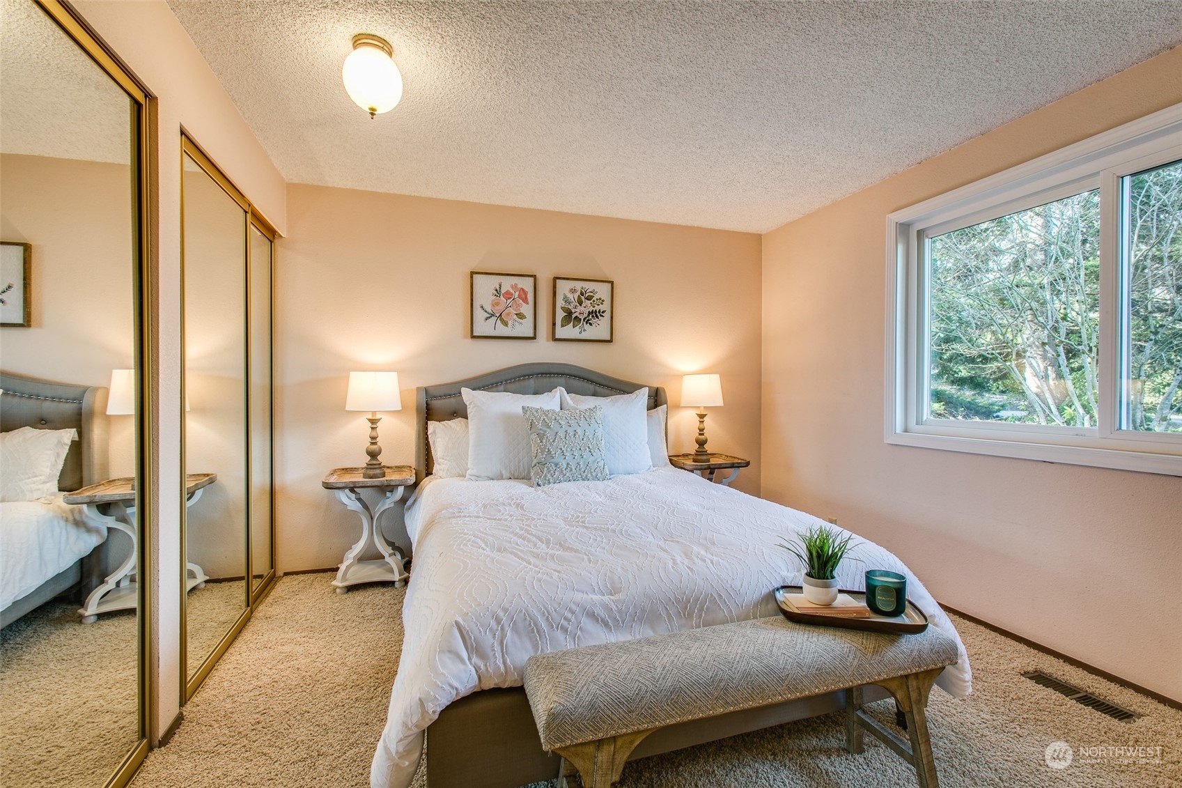 514 Cypress Road Bellingham, WA 98225 - Photo 18 of 31 a bedroom with a bed and wooden floor