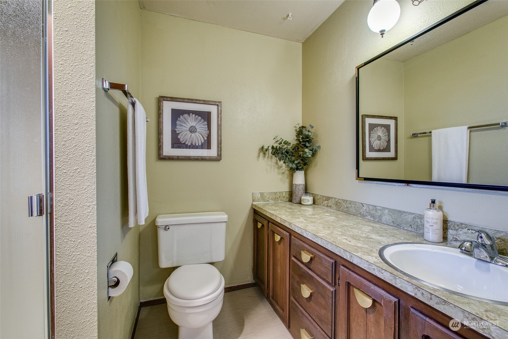 514 Cypress Road Bellingham, WA 98225 - Photo 20 of 31 a bathroom with a granite countertop toilet a sink and a mirror
