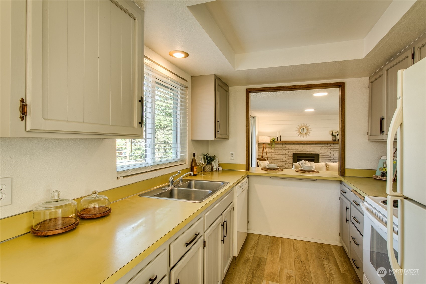 514 Cypress Road Bellingham, WA 98225 - Photo 7 of 31 a kitchen with a sink stove and cabinets