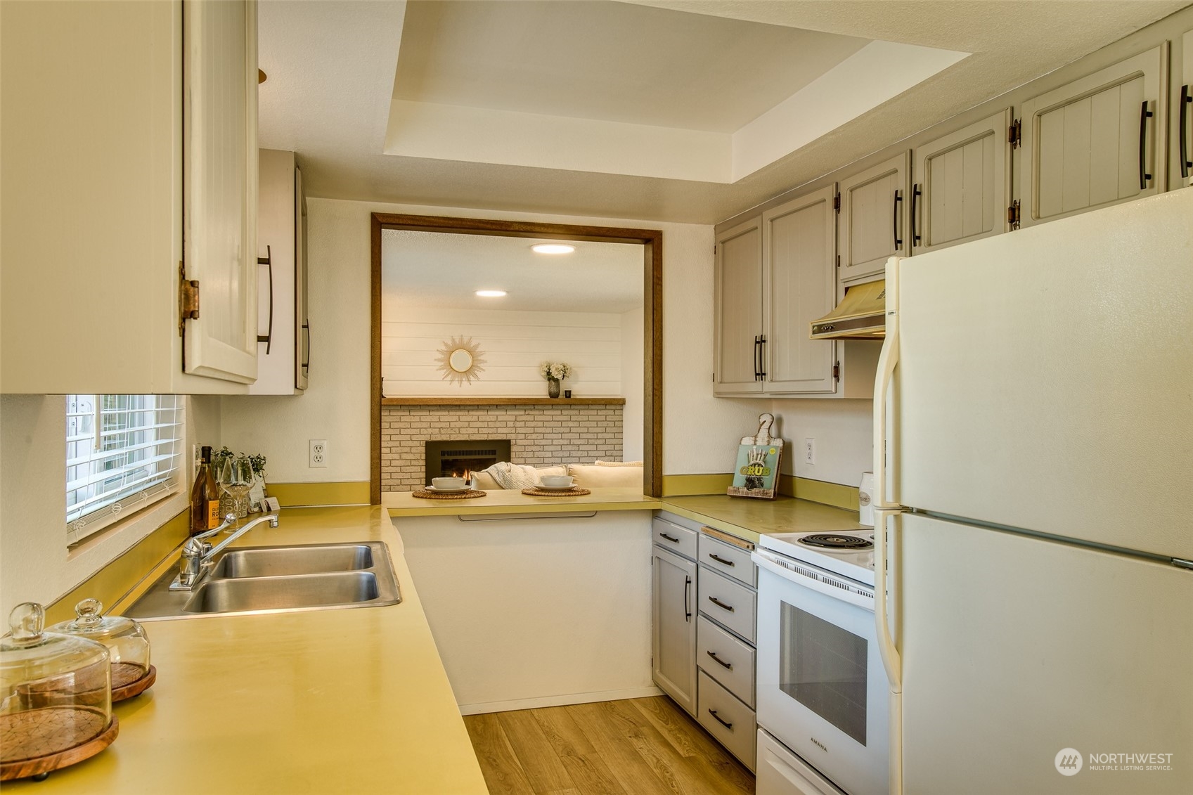 514 Cypress Road Bellingham, WA 98225 - Photo 8 of 31 a kitchen with stainless steel appliances a stove a sink and a refrigerator