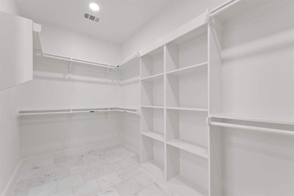 809 South Adelaide Street Terrell, TX 75160 - Photo 7 of 18 a view of an empty walk in closet