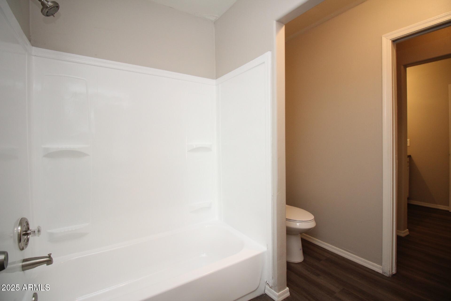 1732 West Maricopa Street, Unit 1 Phoenix, AZ 85007 - Photo 11 of 30 a bathroom with a bathtub