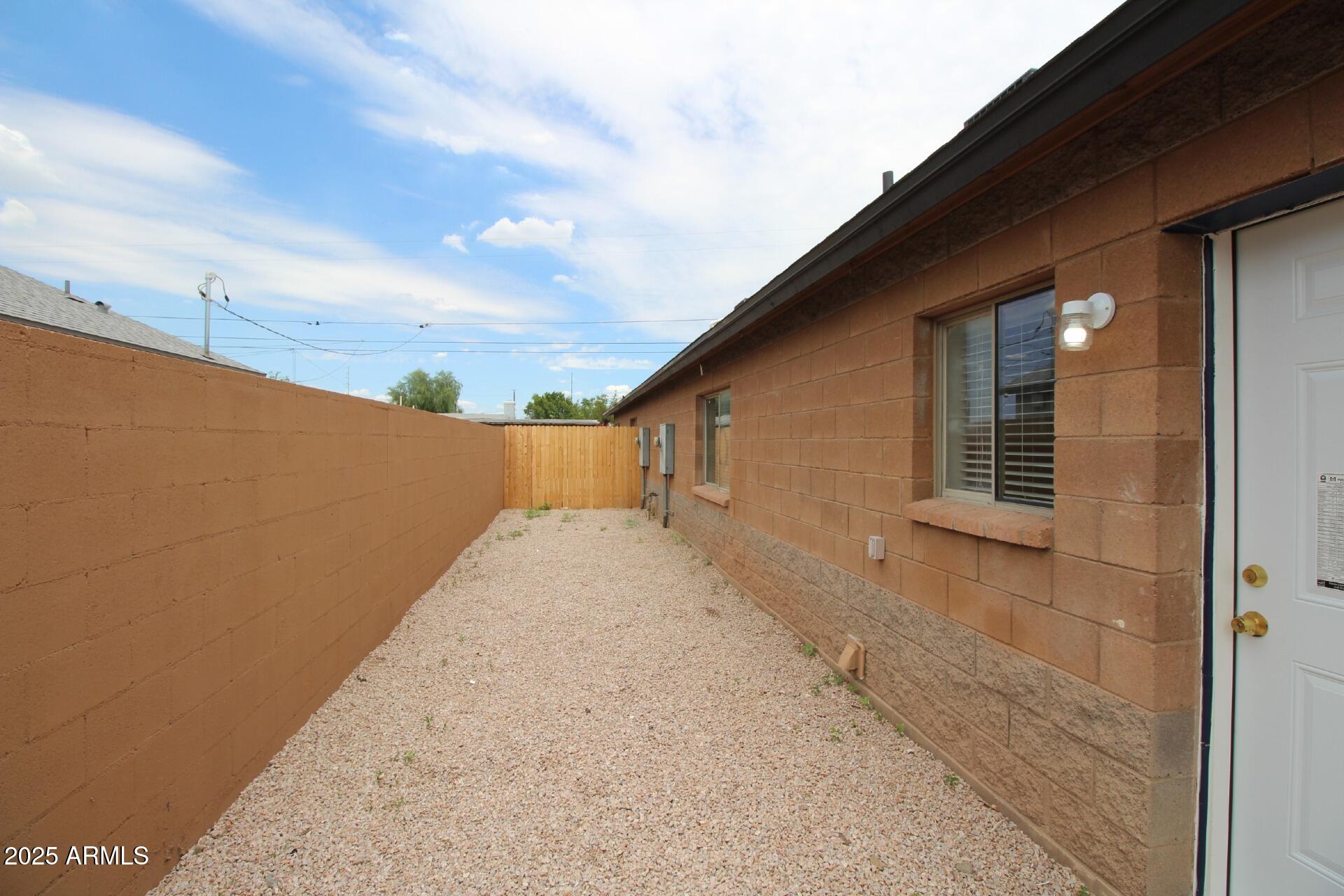 1732 West Maricopa Street, Unit 1 Phoenix, AZ 85007 - Photo 28 of 30 a view of a backyard