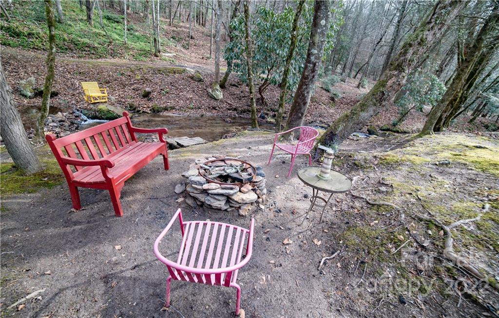 Vl Vl Shell Creek Road Ferguson, NC 28624 - Photo 13 of 19 a view of a backyard with table and chairs