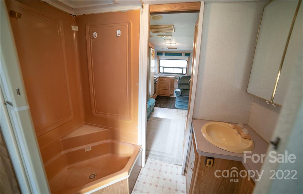Vl Vl Shell Creek Road Ferguson, NC 28624 - Photo 6 of 19 a bathroom with a tub and shower
