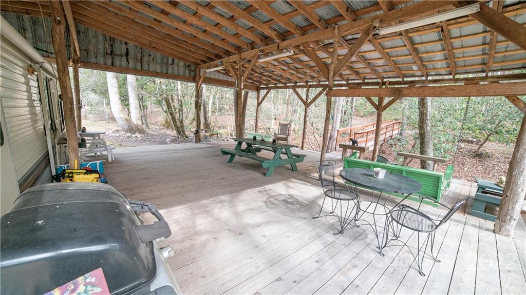 Vl Vl Shell Creek Road Ferguson, NC 28624 - Photo 10 of 19 a building outdoor space with patio furniture and potted plants