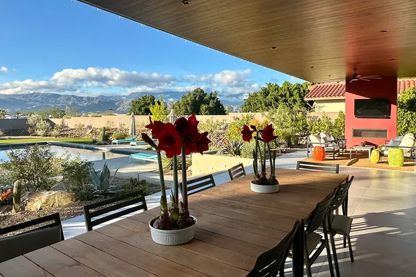 a view of group of people sitting in patio
