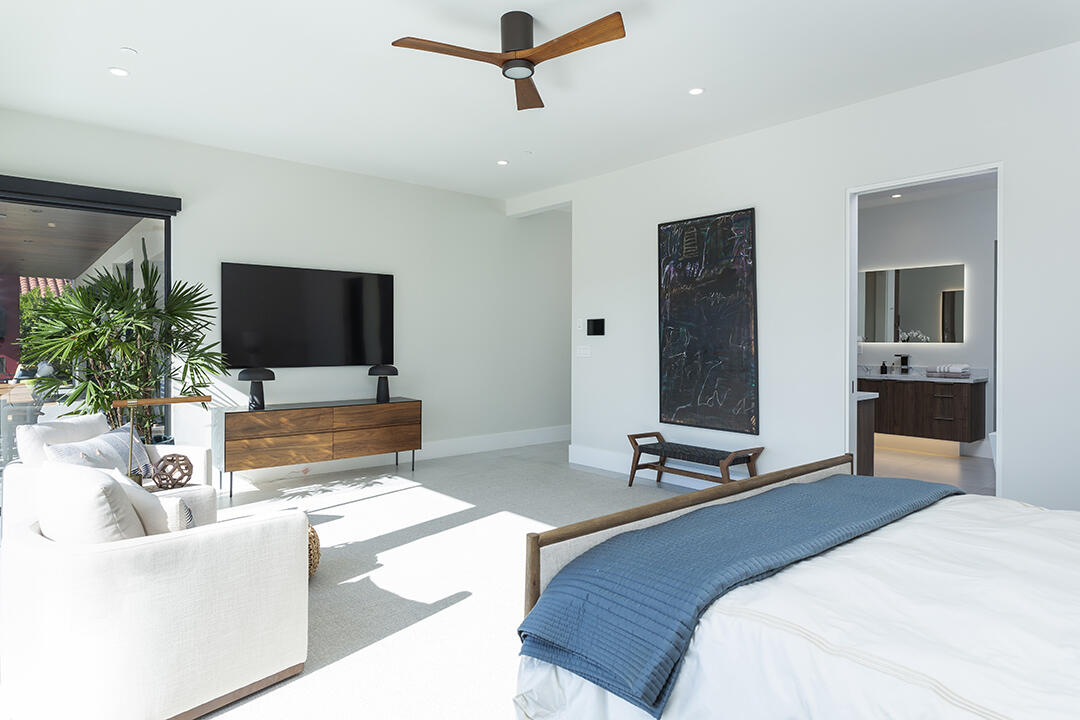 72145 Vía Vail Rancho Mirage, CA 92270 - Photo 29 of 68 a bedroom with a bed and a flat screen tv