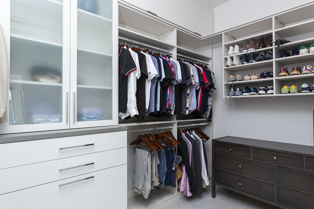 72145 Vía Vail Rancho Mirage, CA 92270 - Photo 35 of 68 a view of walk in closet with clothes and shoes