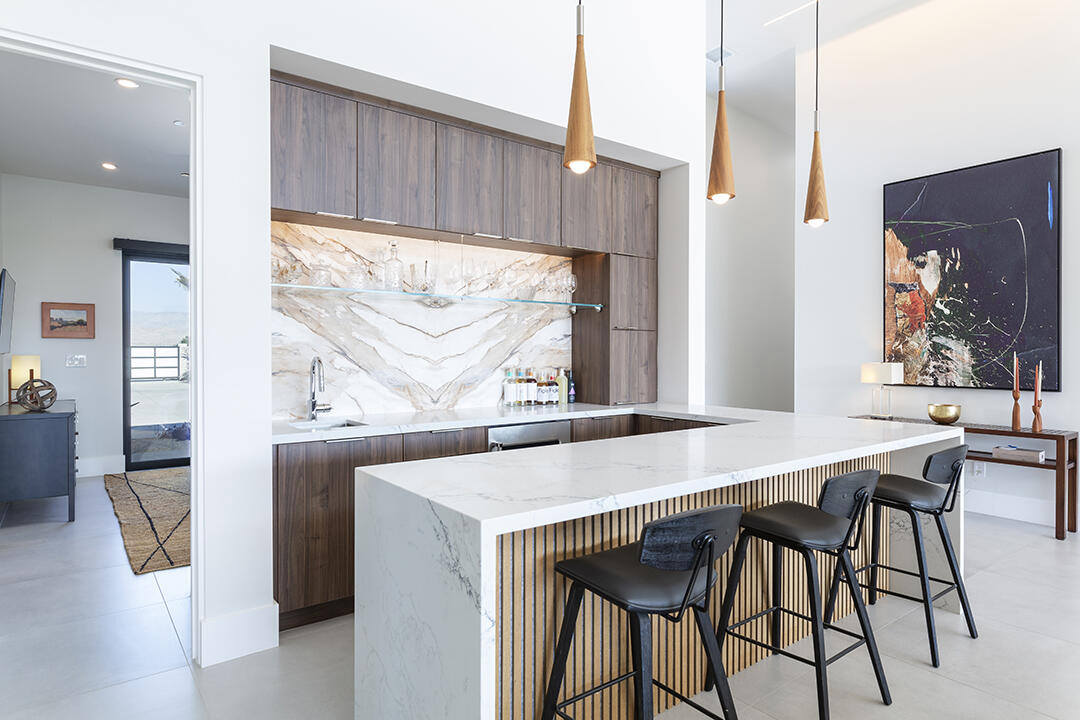 72145 Vía Vail Rancho Mirage, CA 92270 - Photo 36 of 68 a dining hall with stainless steel appliances a table and chairs