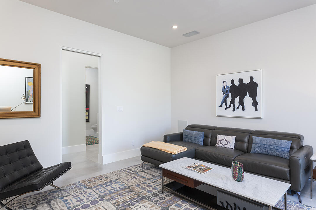 72145 Vía Vail Rancho Mirage, CA 92270 - Photo 44 of 68 a living room with furniture and wooden floor