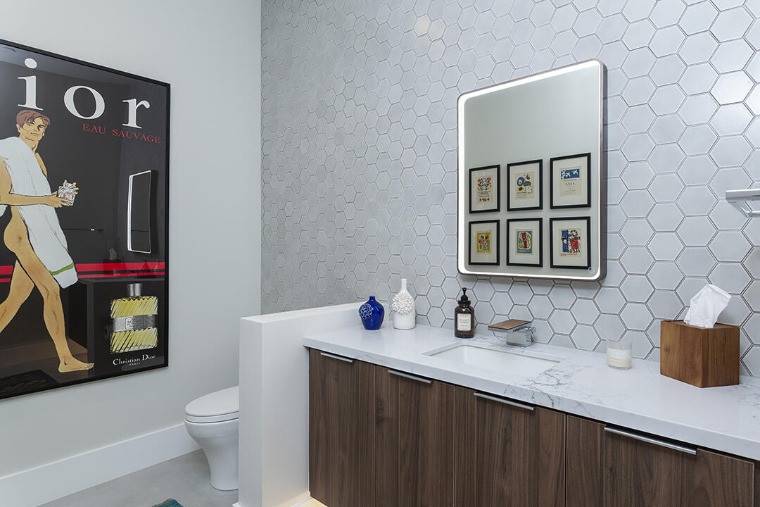 72145 Vía Vail Rancho Mirage, CA 92270 - Photo 45 of 68 a bathroom with a granite countertop sink and a toilet