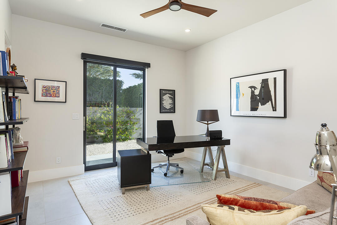 72145 Vía Vail Rancho Mirage, CA 92270 - Photo 46 of 68 a living room with furniture and a window