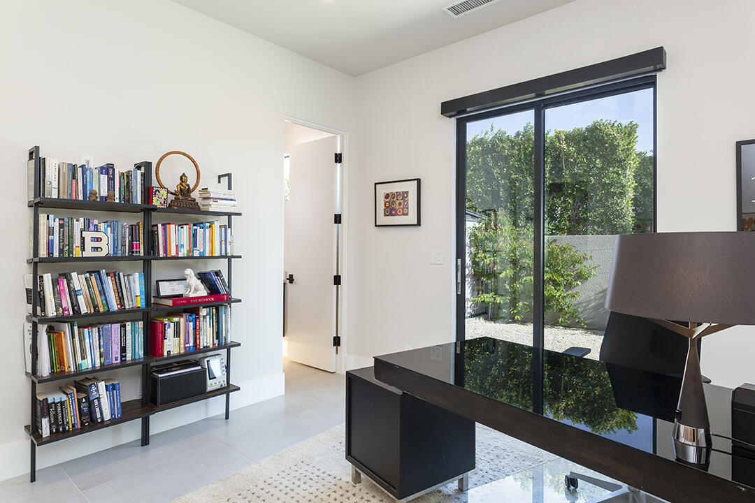 72145 Vía Vail Rancho Mirage, CA 92270 - Photo 48 of 68 a view of a livingroom with furniture and a book shelf