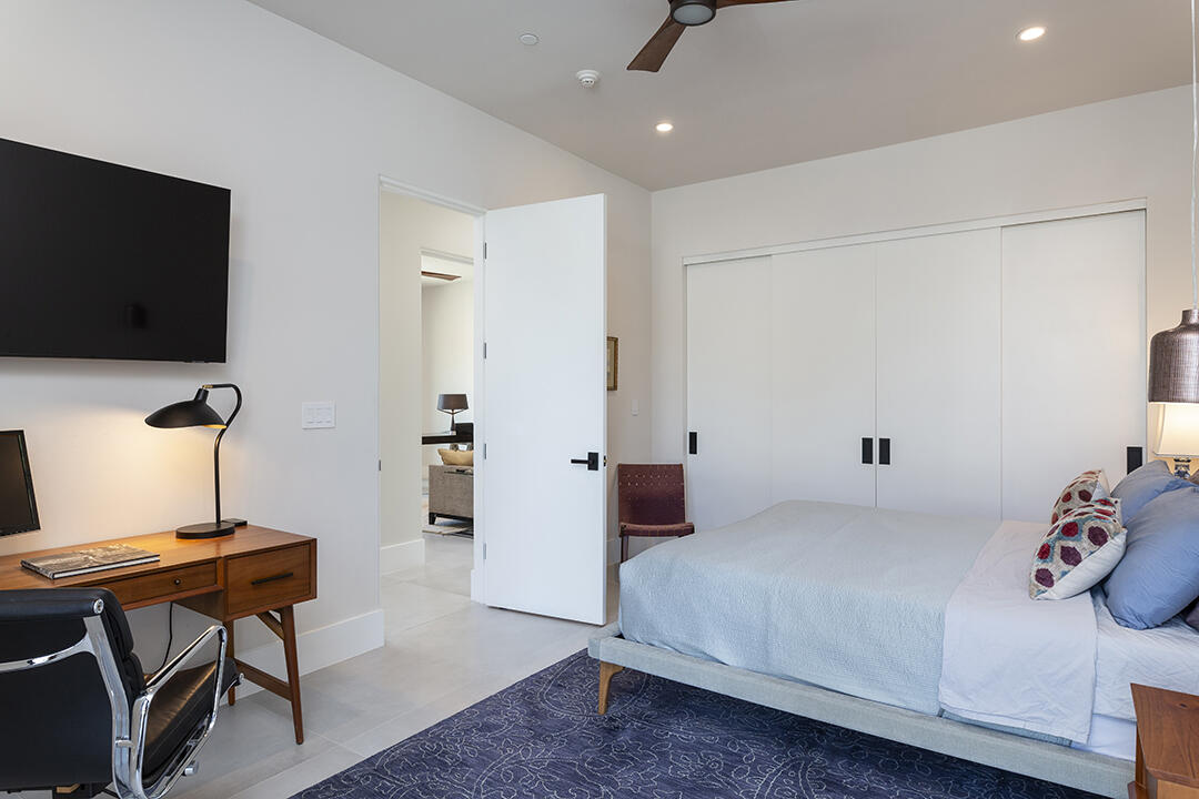 72145 Vía Vail Rancho Mirage, CA 92270 - Photo 51 of 68 a bedroom with a bed and a flat screen tv