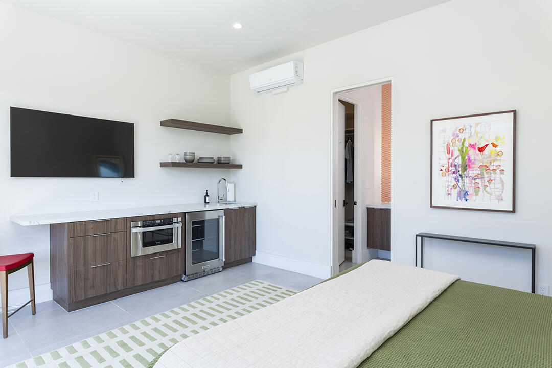 72145 Vía Vail Rancho Mirage, CA 92270 - Photo 57 of 68 a bedroom with a bed and a flat screen tv