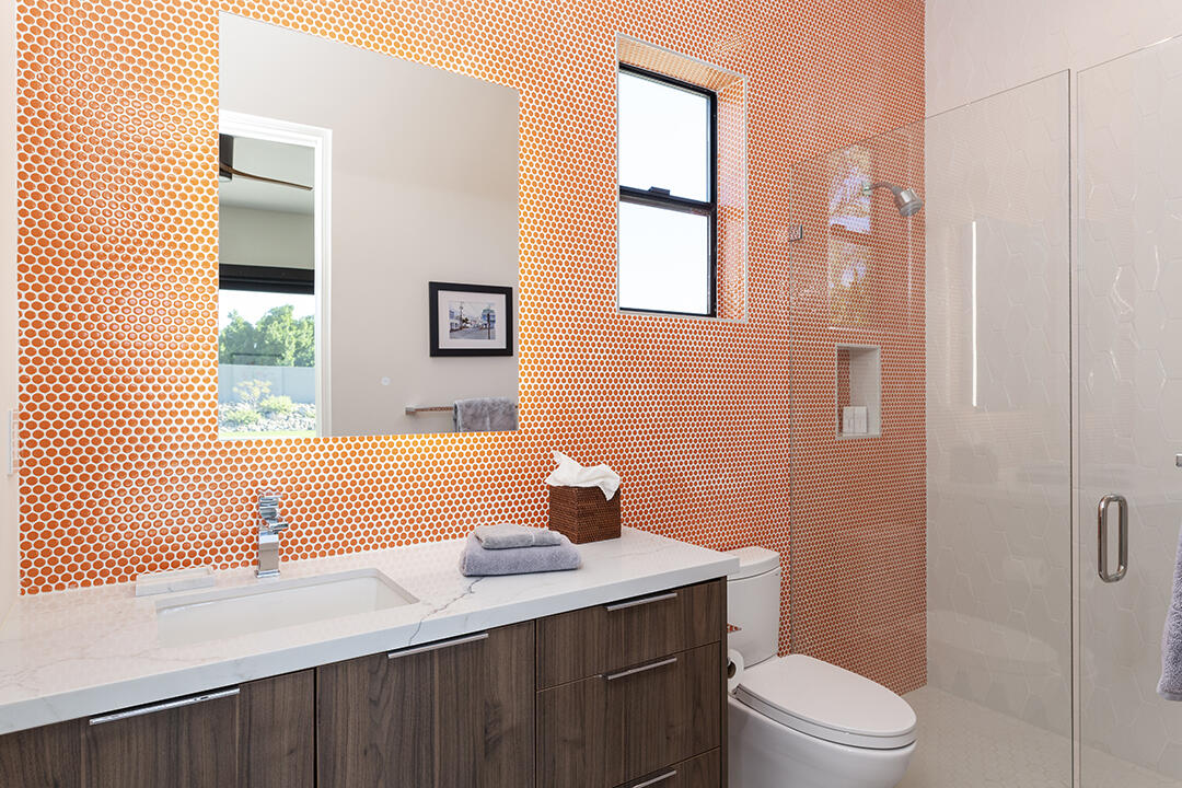 72145 Vía Vail Rancho Mirage, CA 92270 - Photo 58 of 68 a bathroom with a sink a toilet and shower