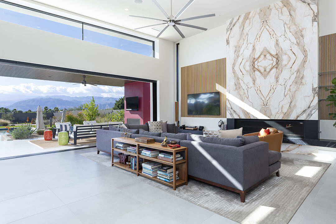 72145 Vía Vail Rancho Mirage, CA 92270 - Photo 9 of 68 a living room with patio furniture and a flat screen tv