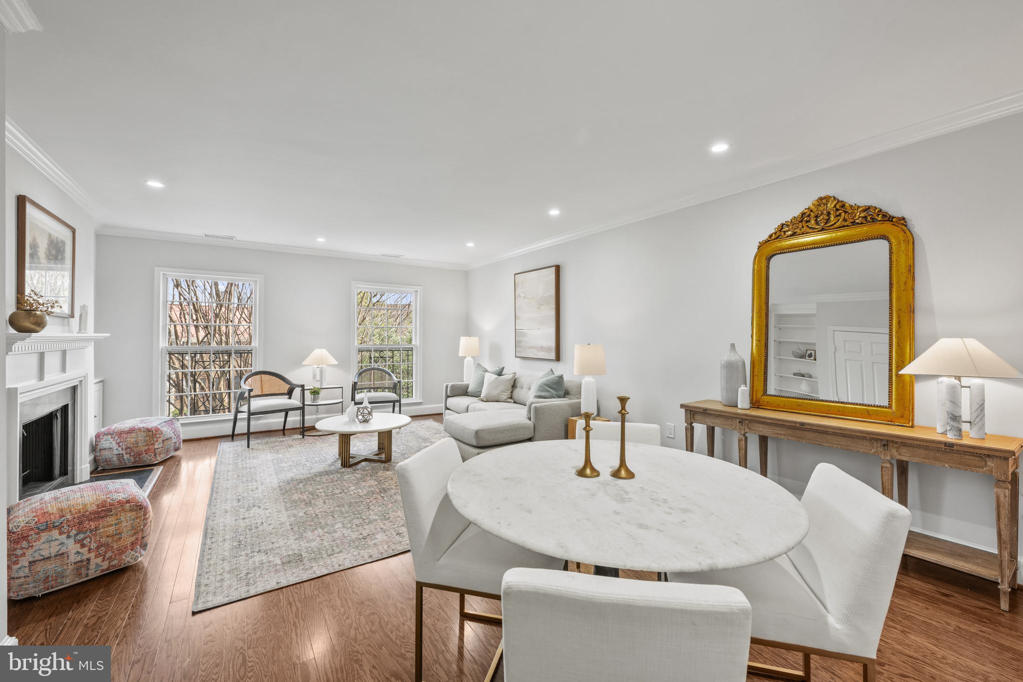 3265 Sutton Place Northwest, Unit B Washington, DC 20016 - Photo 13 of 45 a living room with fireplace furniture and a wooden floor