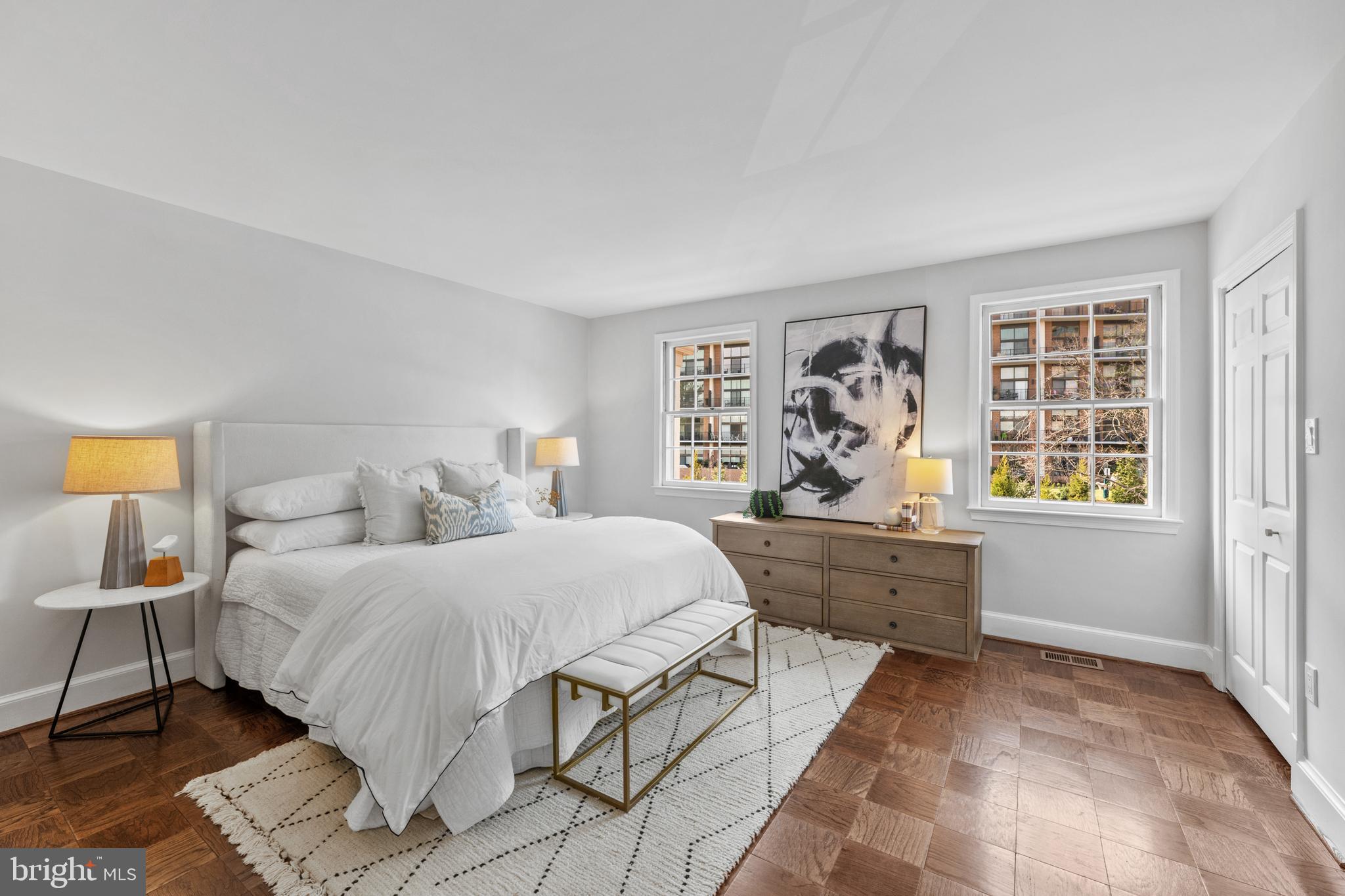 3265 Sutton Place Northwest, Unit B Washington, DC 20016 - Photo 26 of 45 a bedroom with a large bed and a window