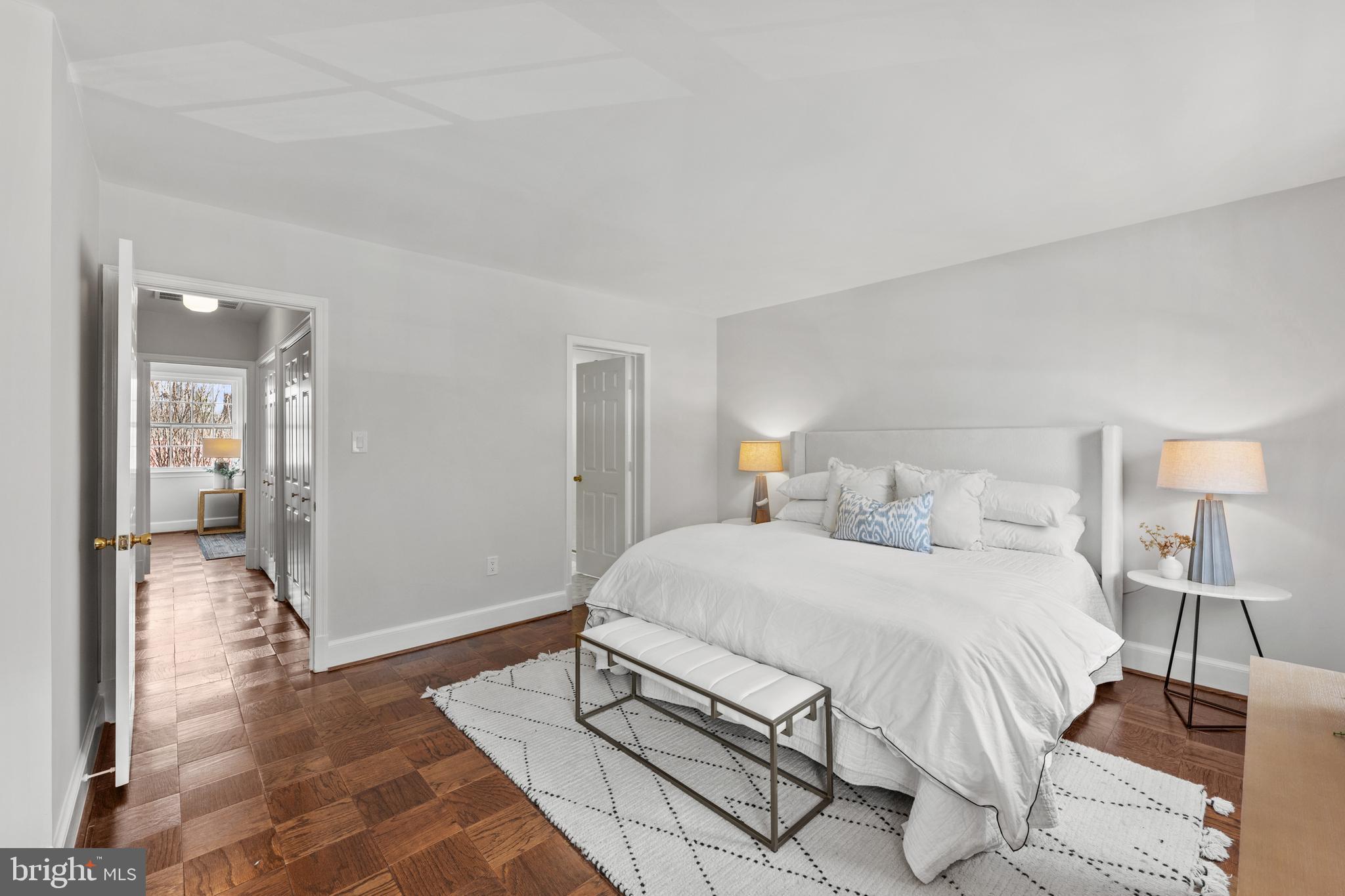 3265 Sutton Place Northwest, Unit B Washington, DC 20016 - Photo 28 of 45 a bedroom with a bed and a mirror