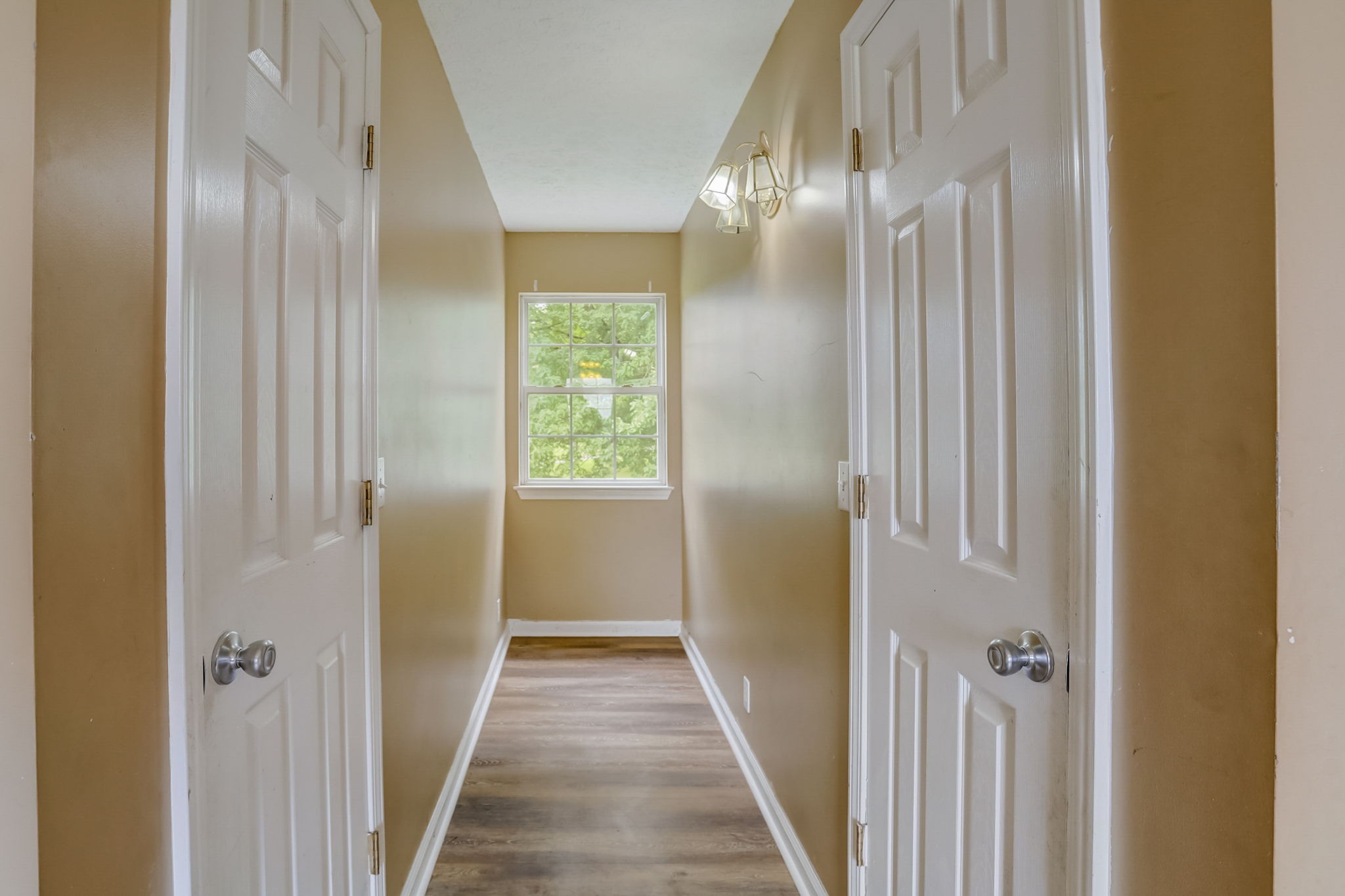 308 Ranch Road Portland, TN 37148 - Photo 19 of 43 a view of a hallway with wooden floor