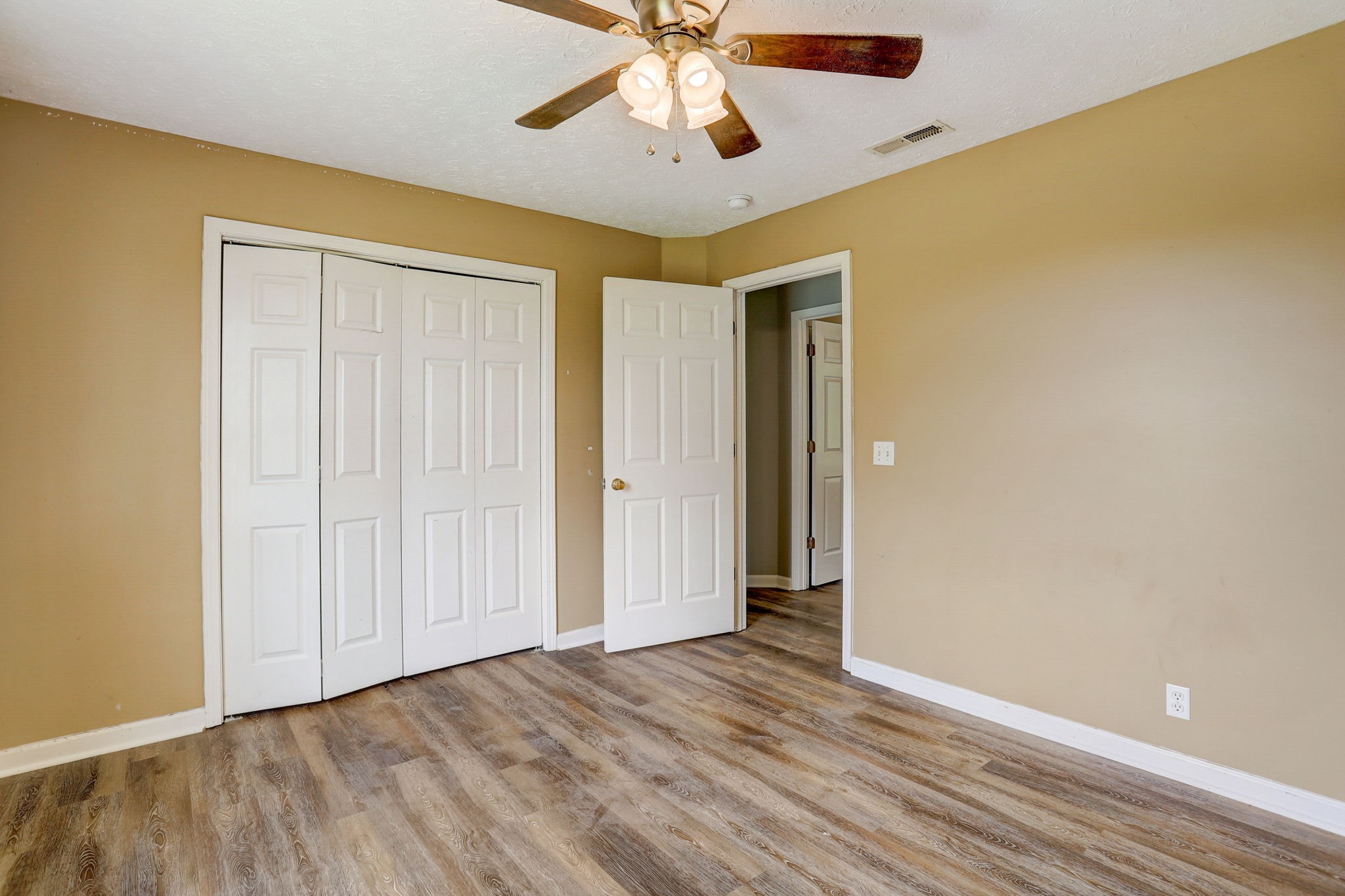 308 Ranch Road Portland, TN 37148 - Photo 24 of 43 wooden floor in an empty room with a window