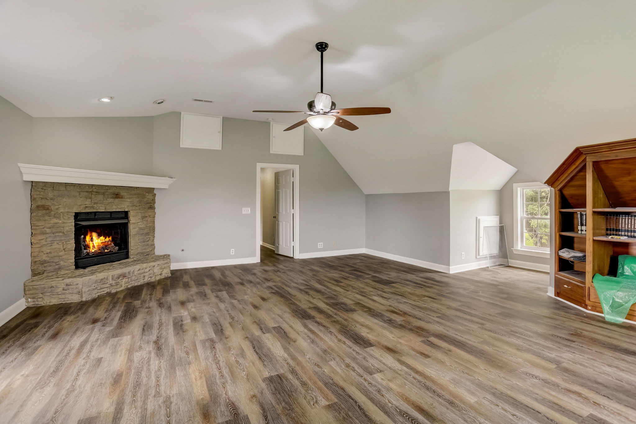 308 Ranch Road Portland, TN 37148 - Photo 26 of 43 a view of empty room with wooden floor and fireplace