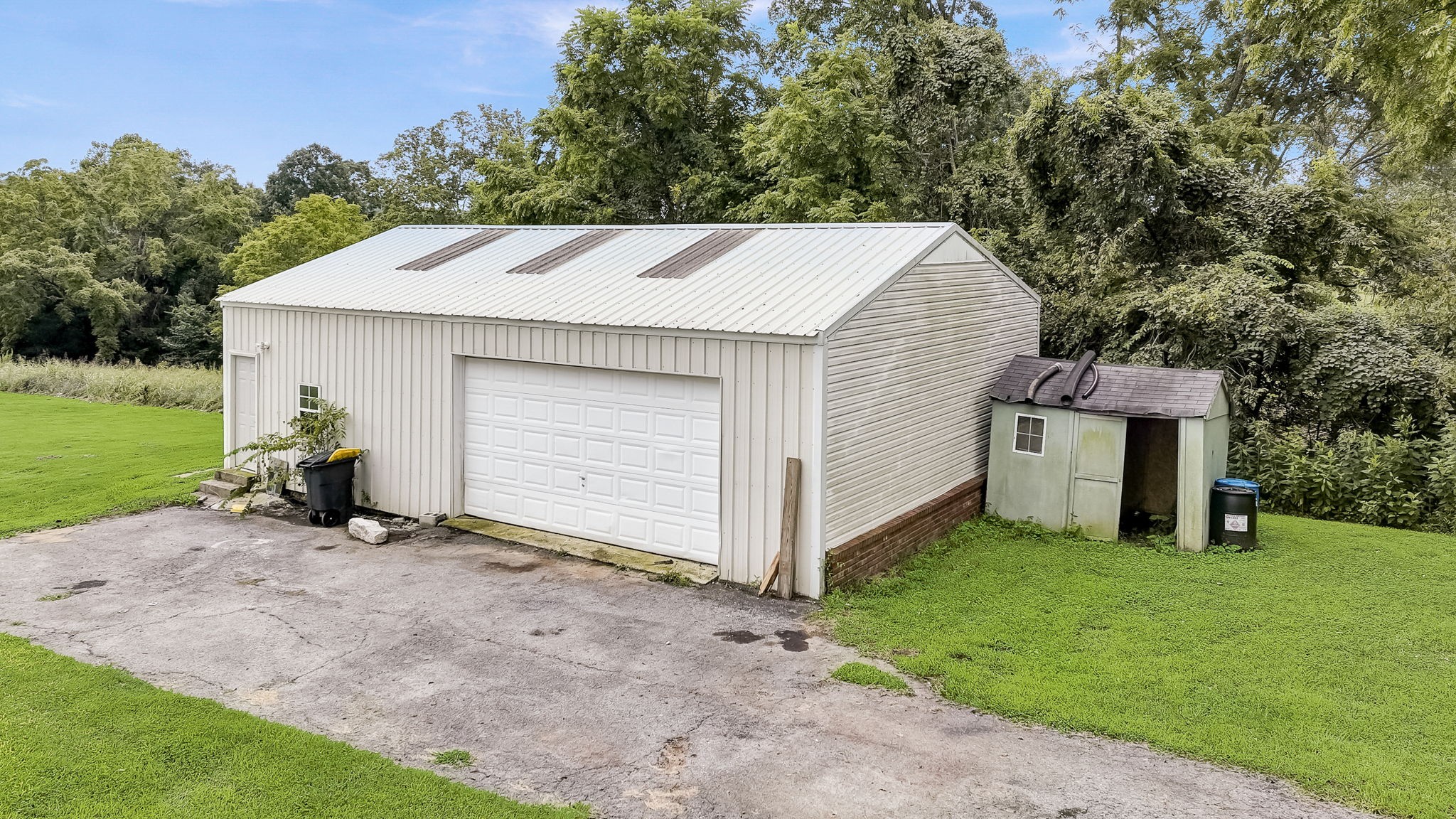 308 Ranch Road Portland, TN 37148 - Photo 35 of 43 a view of a house with a yard