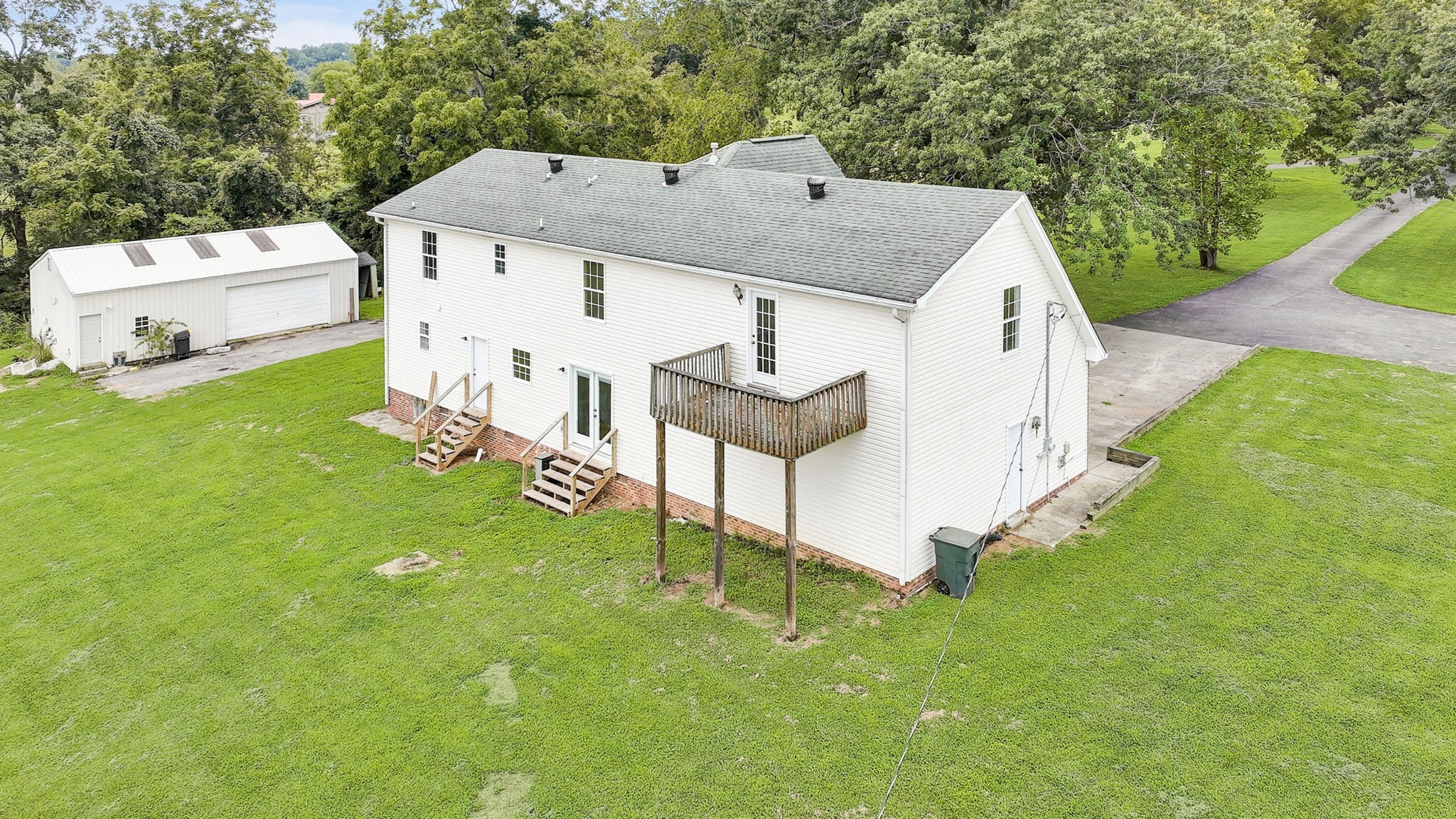 308 Ranch Road Portland, TN 37148 - Photo 36 of 43 a aerial view of a house with a yard and sitting area
