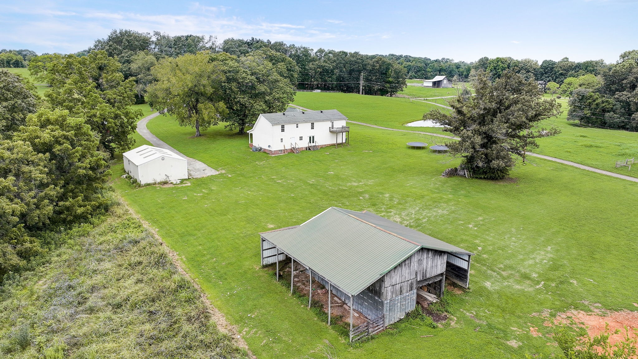 308 Ranch Road Portland, TN 37148 - Photo 38 of 43 a view of a house with a yard