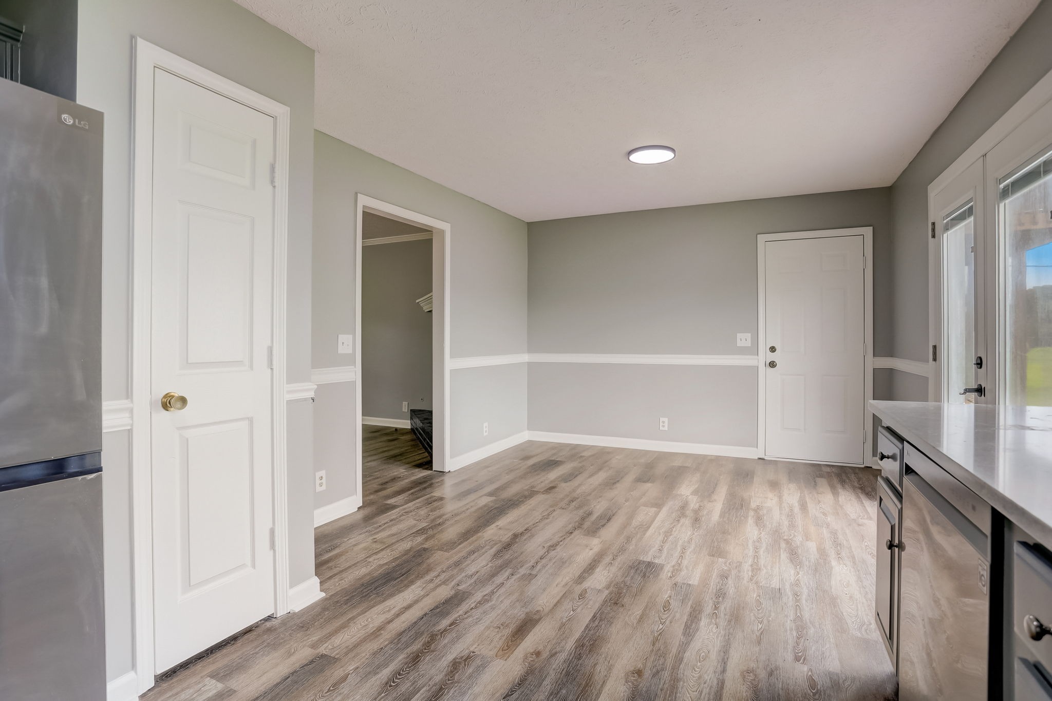 308 Ranch Road Portland, TN 37148 - Photo 10 of 43 wooden floor in an empty room with a window