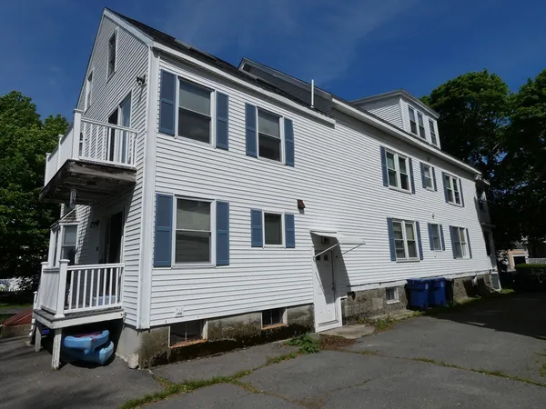 a front view of a house with a porch