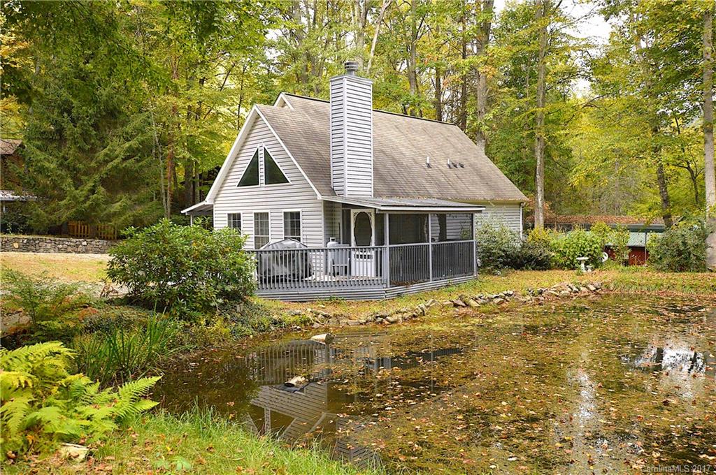 303 Spring Lake Road Maggie Valley, NC 28751 - Photo 6 of 25 a house view with a garden space