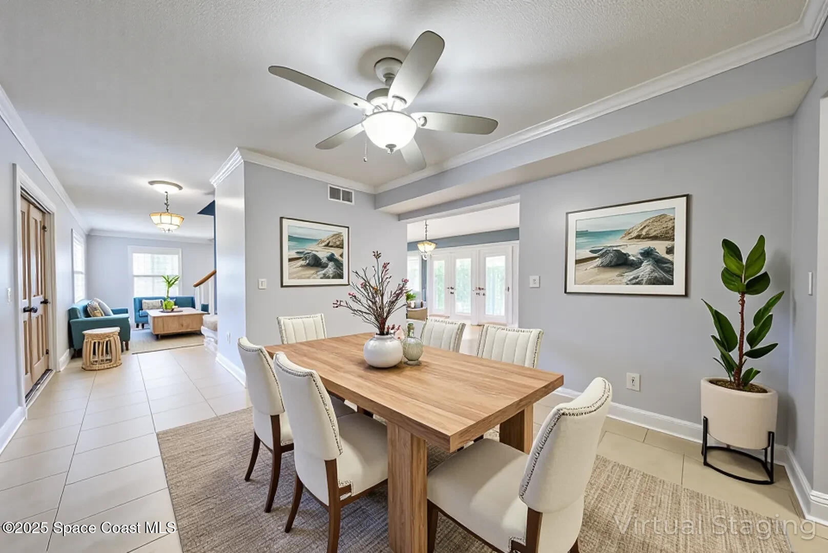 949 Brunswick Lane Rockledge, FL 32955 - Photo 19 of 43 a view of a dining room with furniture and wooden floor