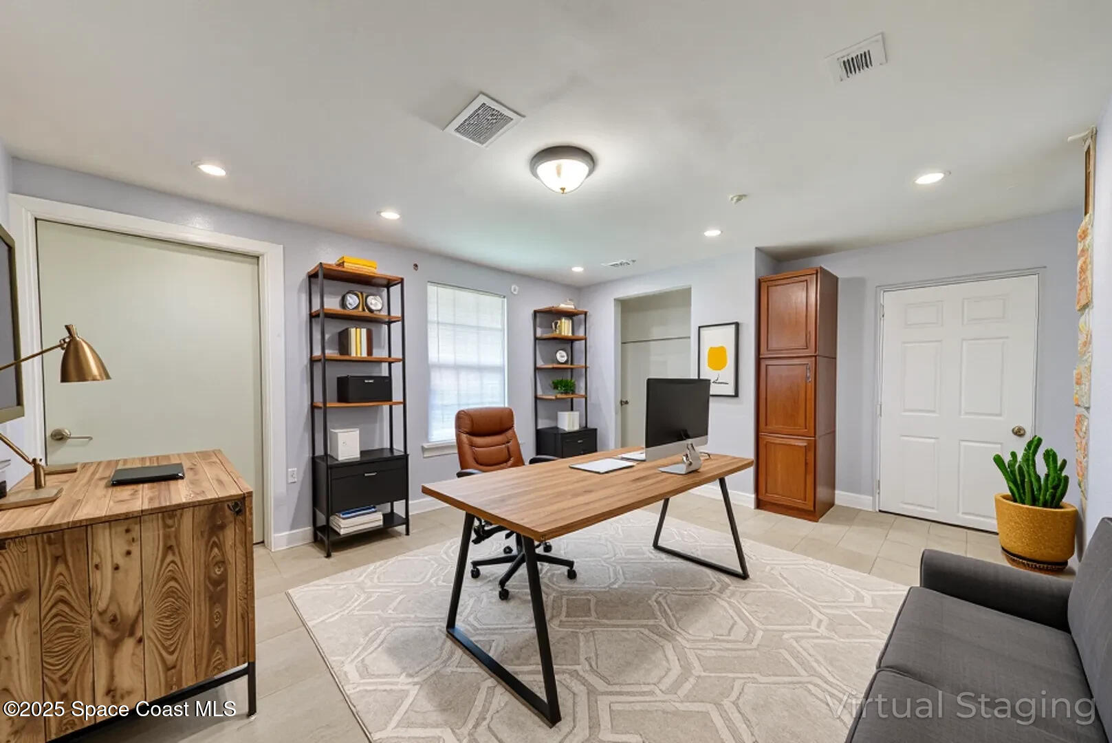 949 Brunswick Lane Rockledge, FL 32955 - Photo 20 of 43 a view of a workspace with furniture